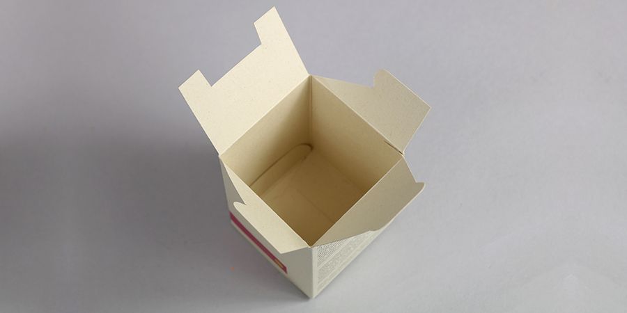 Faltschachteln mit Automatikboden - Beispiel Crémant Flaschenverpackung
